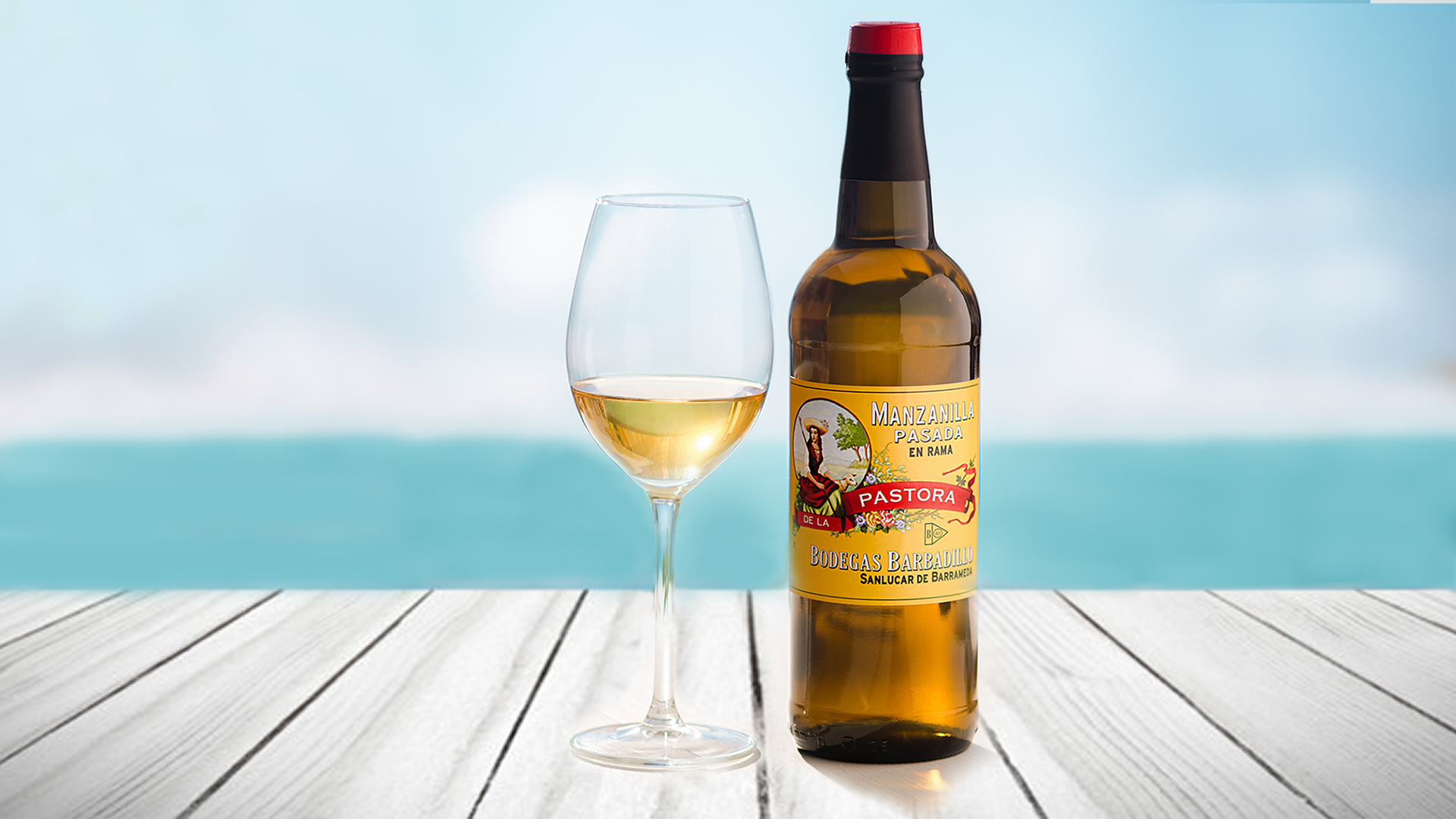Flaskan och glas av Manzanilla "Pasada en Rama Pastora" 